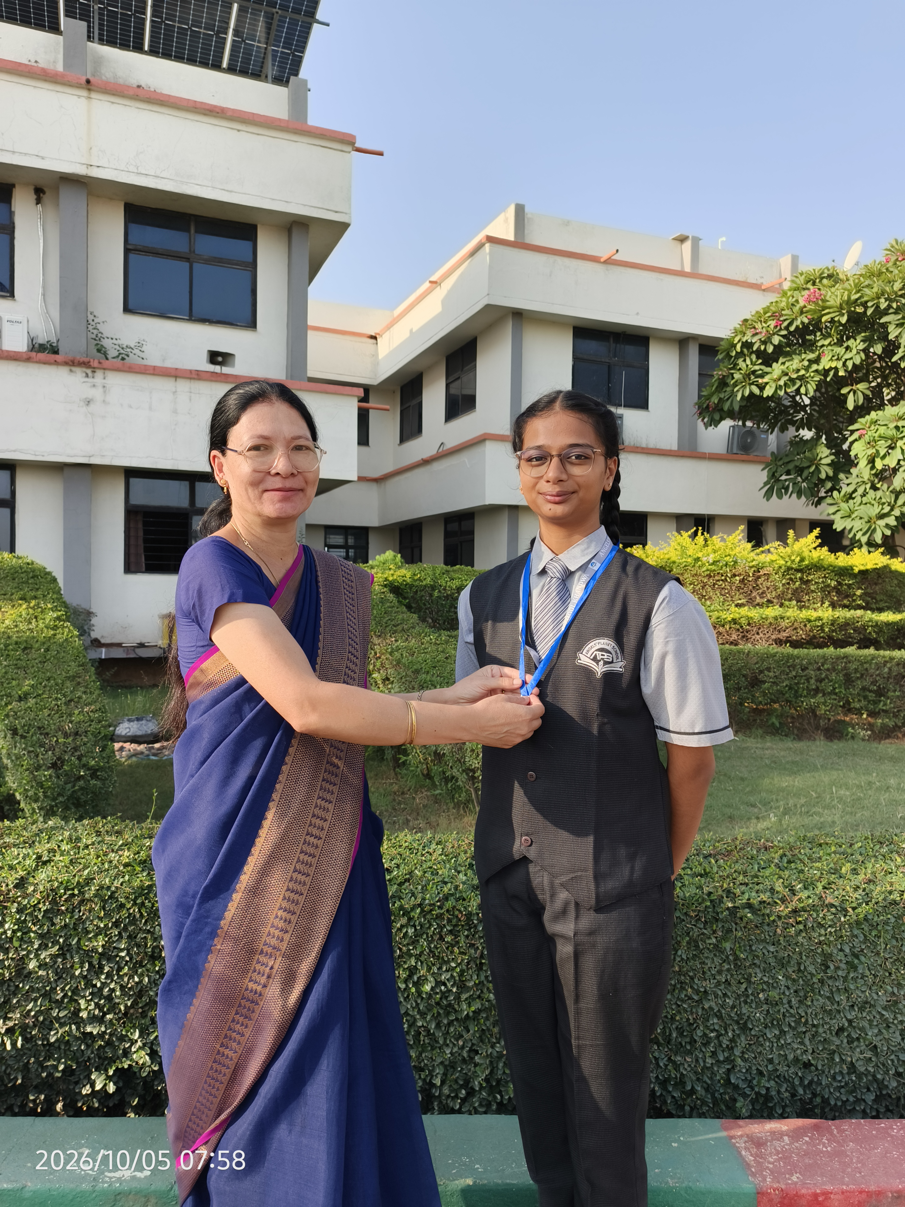 Student receiving recognition at school