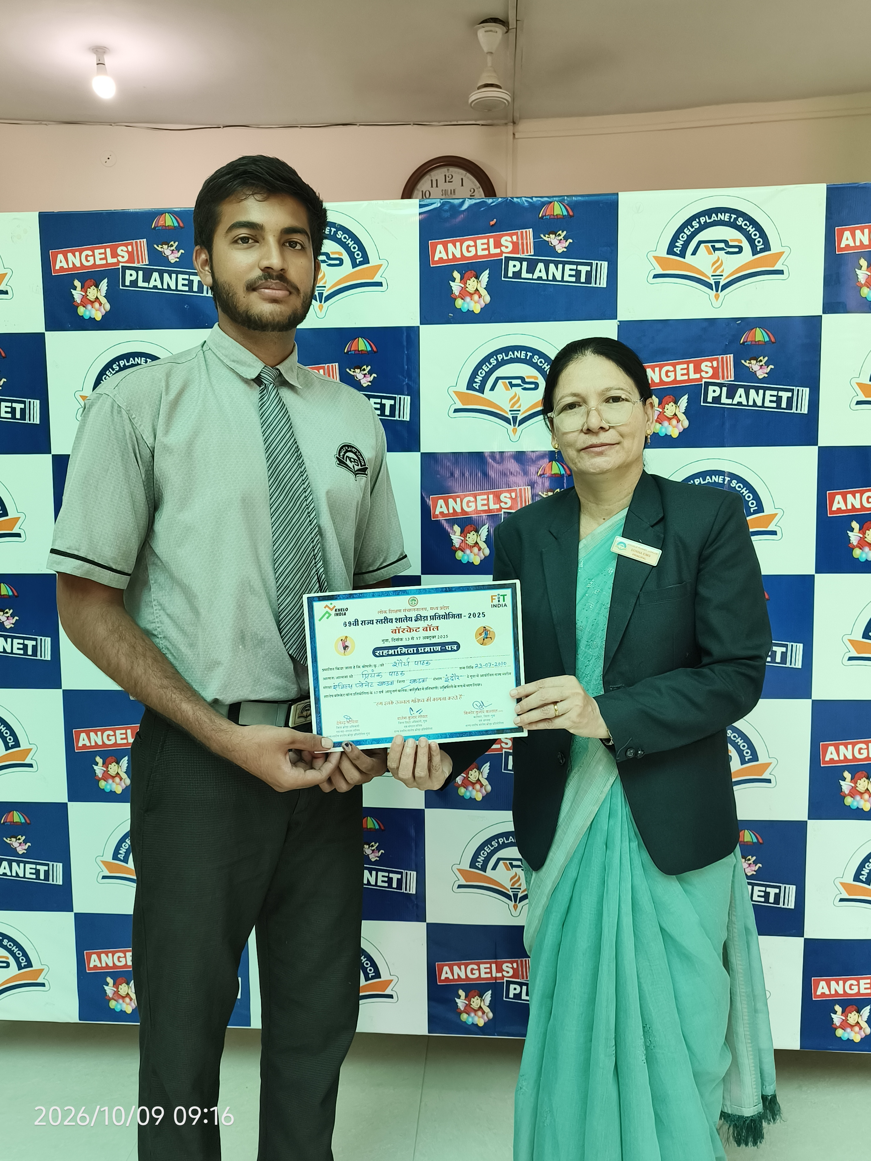 Student receiving a sports certificate