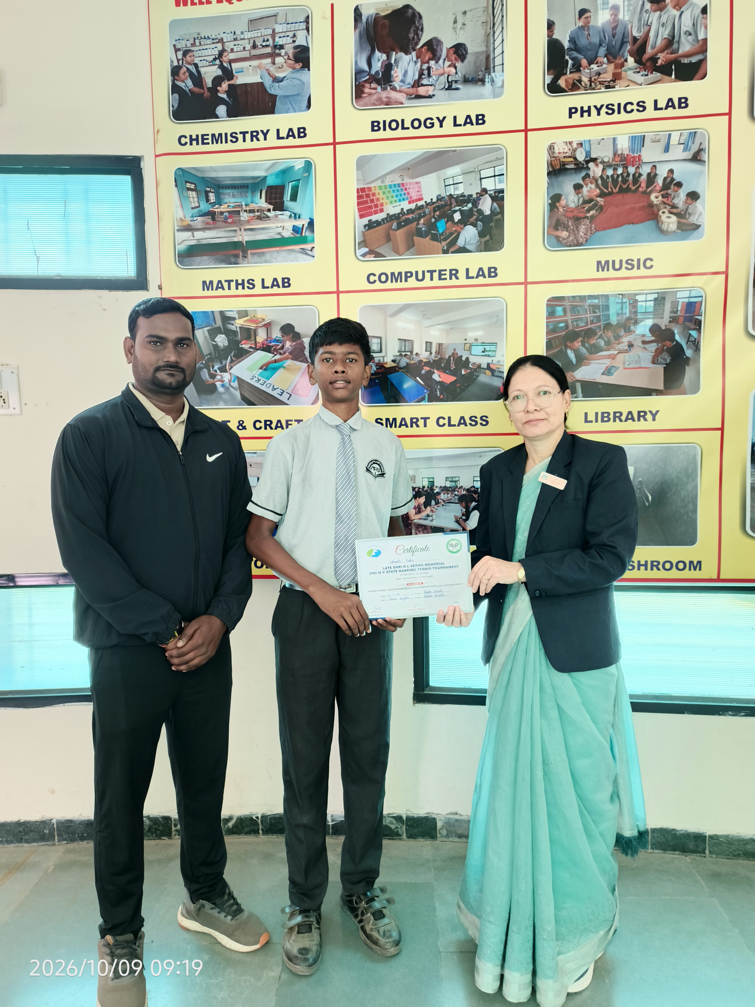 Student receiving a competition certificate